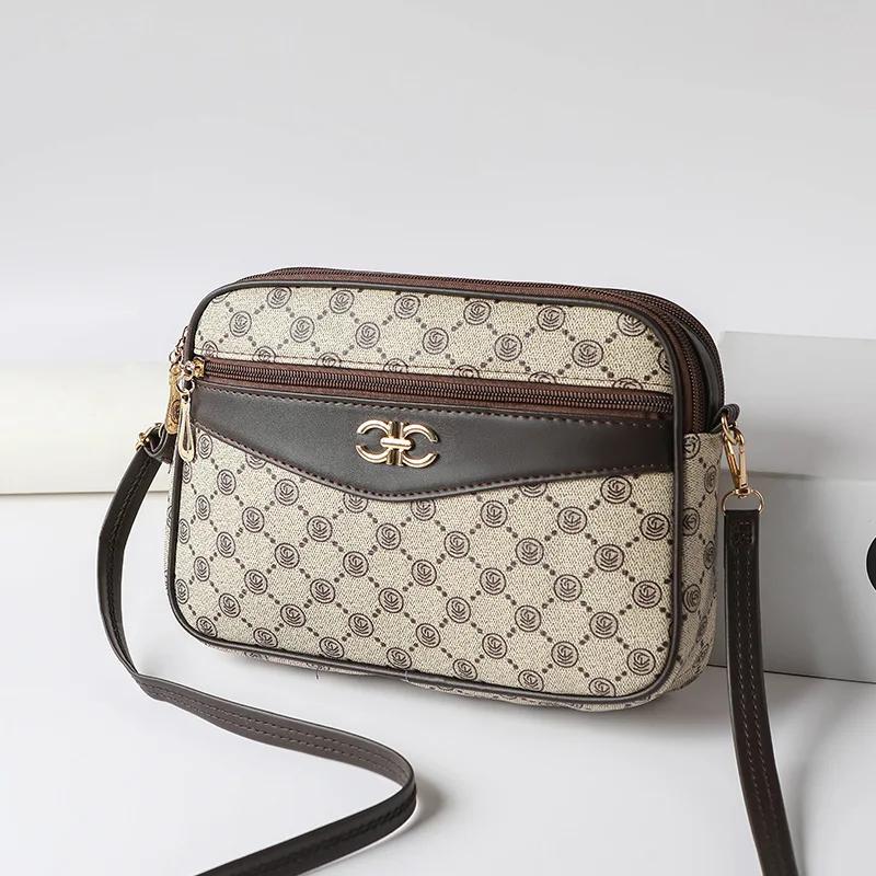 Malá messenger kabelka Nová velkokapacitní dámská diagonální crossbody značková taška pro maminky Středního věku Čtyřvrstvá taška na mobilní telefon