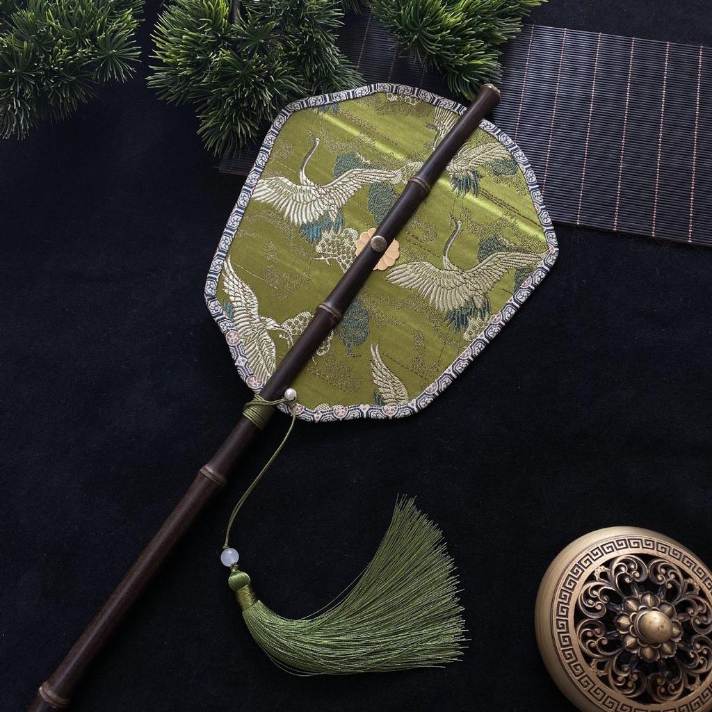 Hanfu Round Fan: Ancient-Style Purple Bamboo with Long Handle, Tassel, and Foldable Design.