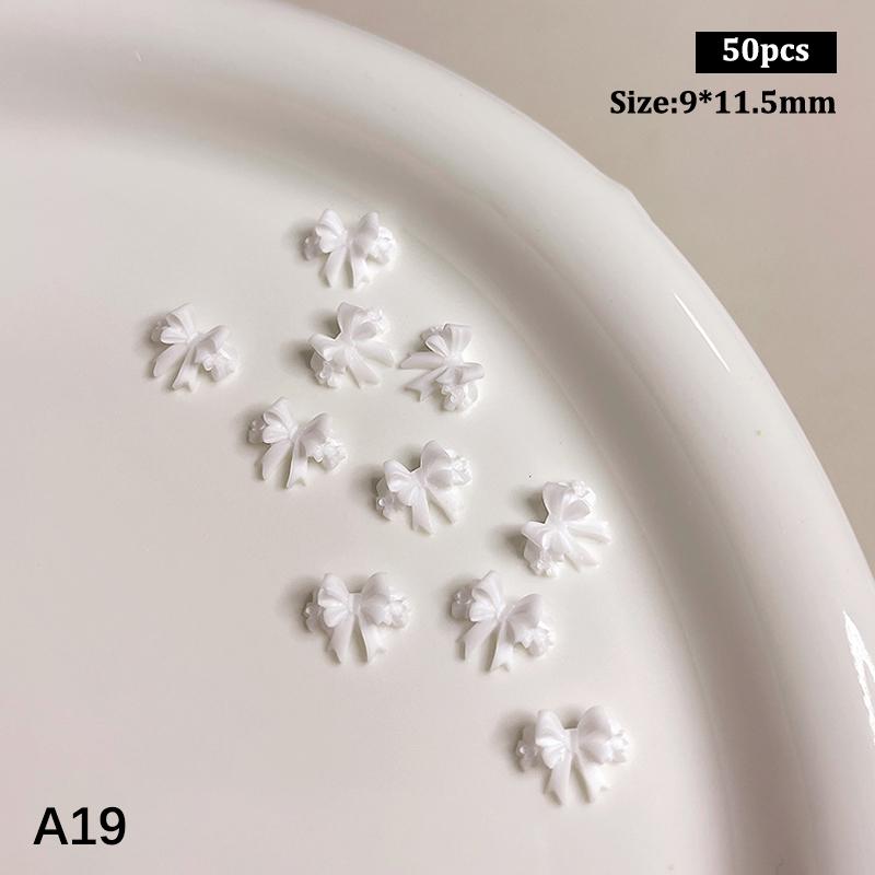 50 vnt. Ilgi banguoti lankeliai Nagų dailės priedai 2 dydžiai Spalvingi kaspino lankeliai 3D dervos nagų pakabukai Japoniškas nagų dekoras Mielos detalės Kaspinas