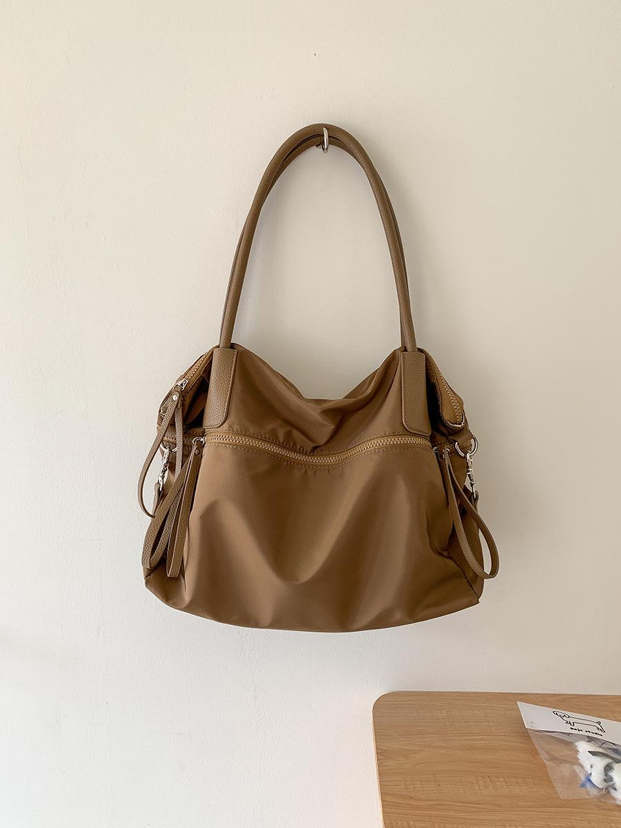 

New college student messenger bag women s large-capacity casual tote bag pleated design nylon shoulder bag women
