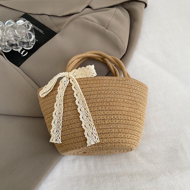 

New fashion and art handmade grass weaving less lady pastoral seaside vacation beach photo versatile handbag коричневый