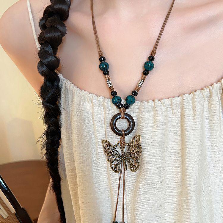 Bohemian tassel long necklace women's new new Chinese butterfly national style retro collarbone chain neck chain