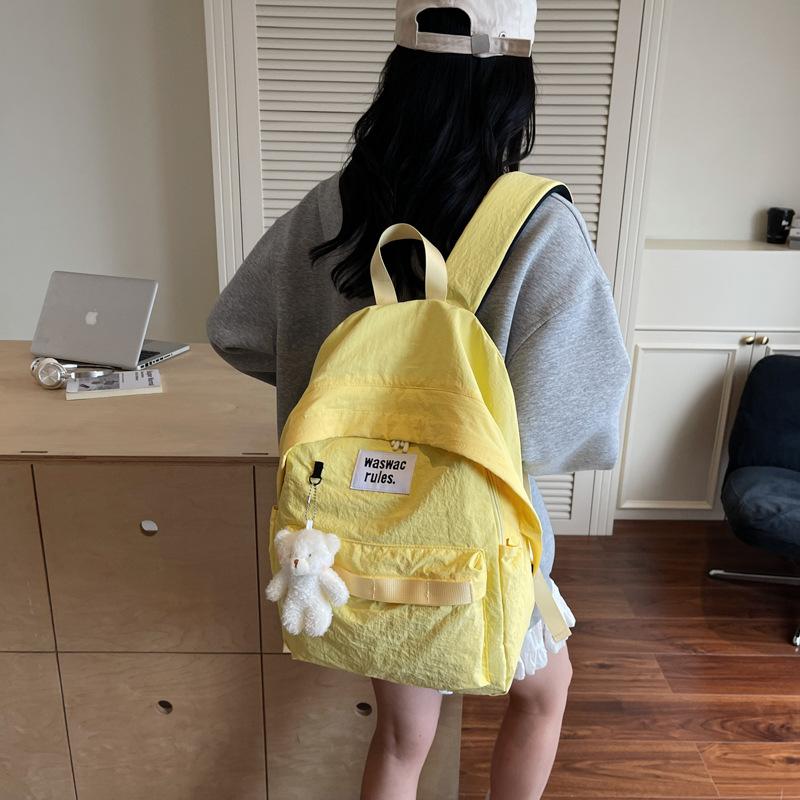 Niche ins style schoolbag female college student Japanese casual large-capacity backpack junior high school student simple design backpack