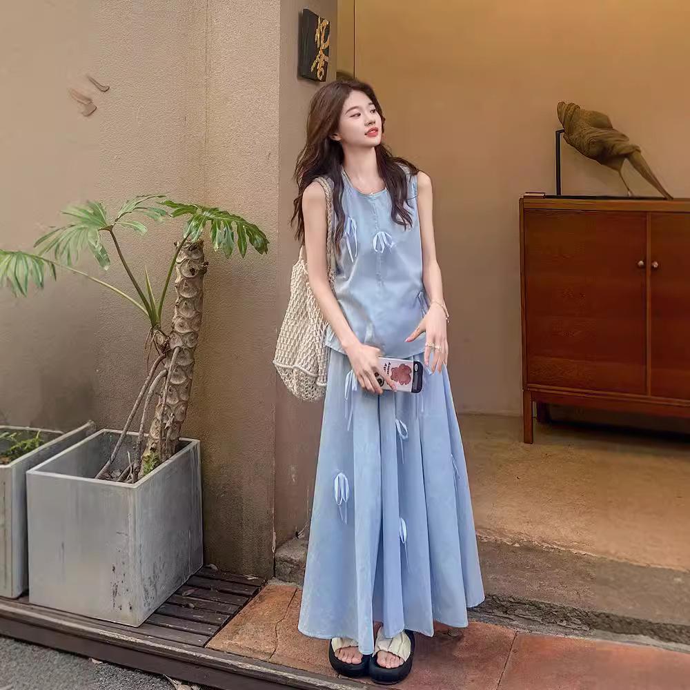 

Женский летний комплект: жилет с бантом и миди-юбка А-силуэта с высокой талией S