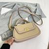 Spring niche design fashionable contrasting color saddle bag portable shoulder crossbody trendy women's bag