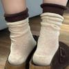 Grey Socks with Rolled-up Edges, Piles of Socks, Burken Shoes, Mid-calf Socks, and Contrasting Long Socks Are Trendy