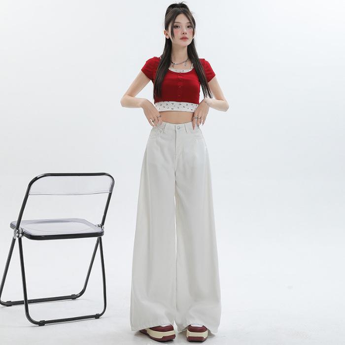 

Женские белые брюки палаццо из тенселя с высокой посадкой - Коллекция Лето 2024 Small