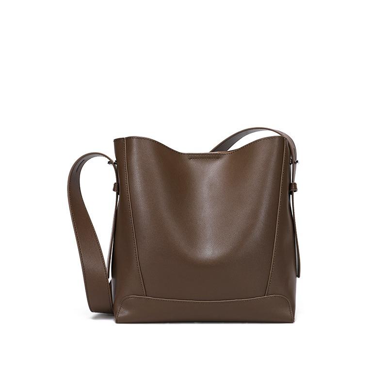 Cowhide bag women's versatile commuter bucket bag new leather women's bag high-end niche design shoulder bag