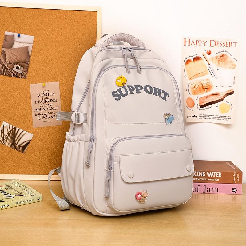 

Высококачественный, свежий и милый рюкзак конфетных цветов, легкий и вместительный рюкзак для учеников средней школы