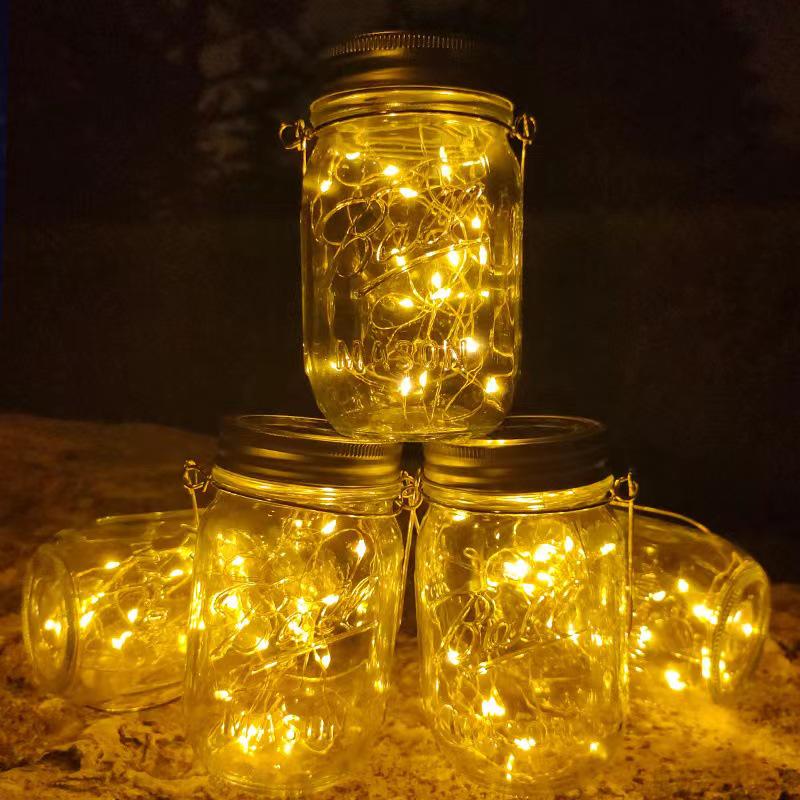 Rainproof Solar Mason Jar Wish Light for Garden, Balcony, and Villa Decor.