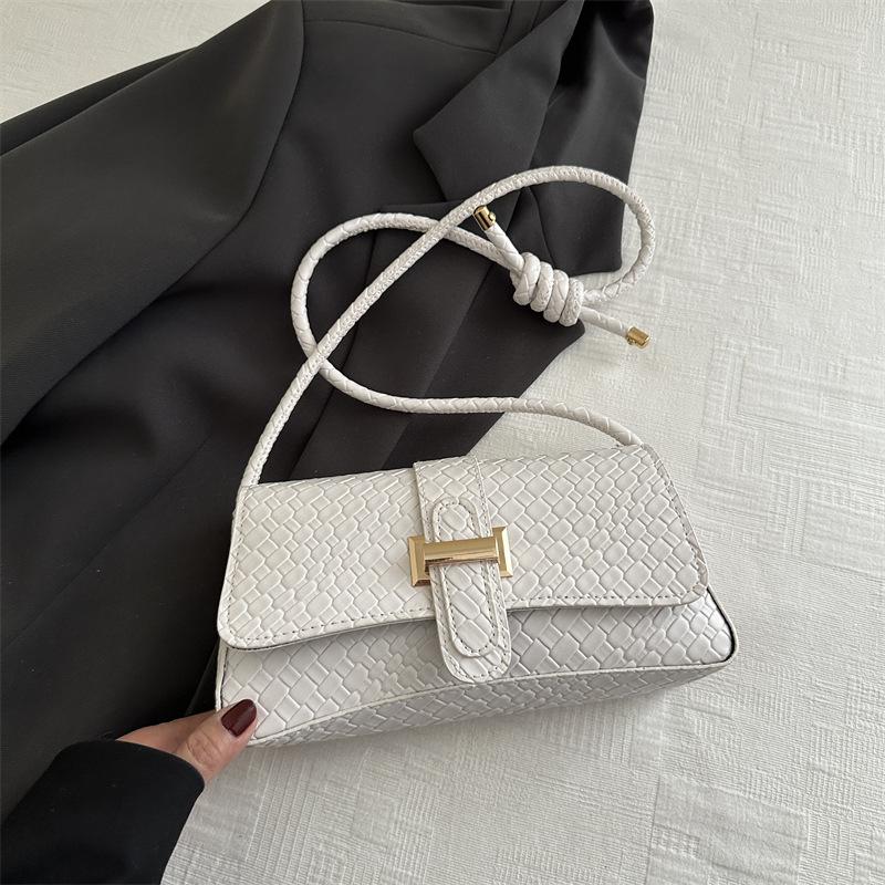 Bag shoulder women's bag 2025 summer new stone pattern simple foreign style handbag solid color personalized small square bag