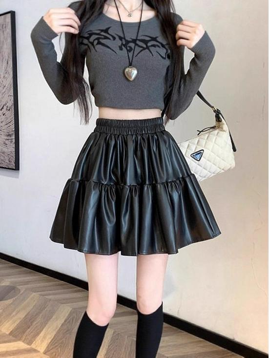 Melade Coffee Pleated PU Leather A-line Skirt with Anti-exposure Fluffy Design