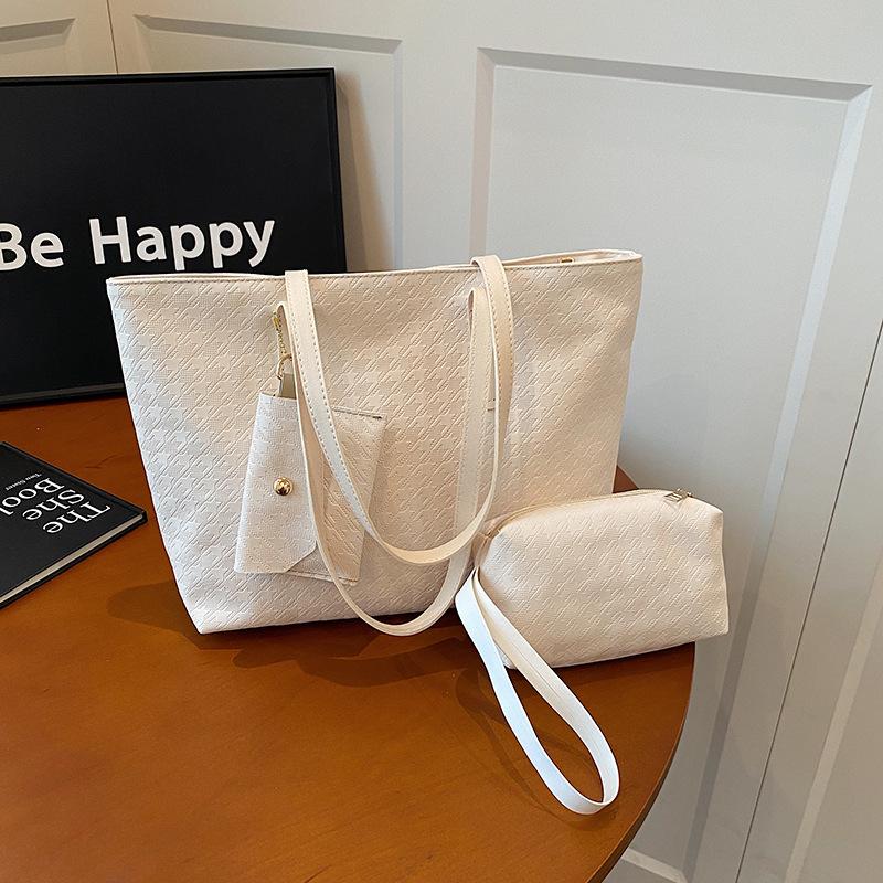 This year's new fashionable textured woven pattern handbag commuting shoulder bag going out travel three-piece tote bag