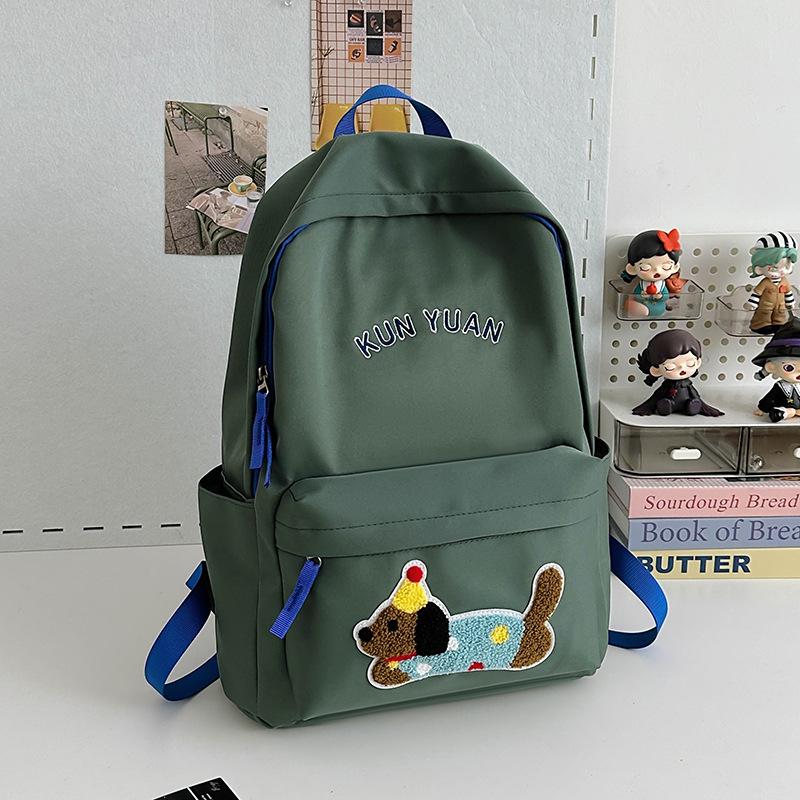 Schoolbag new cute puppy backpack large capacity primary school students junior high school students lightweight schoolbag simple fashion alphabet 