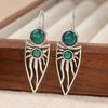 Vintage Hand Carved Hollowed Inlaid Synthetic Emerald Silvery Plated Dangle Earrings Women Exquisite Banquet Jewelry Accessories
