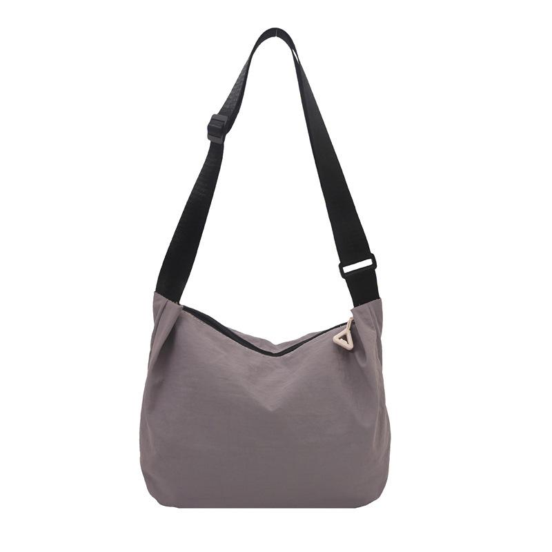 

Literary and fashionable going out commuting dumpling bag large capacity canvas bag women s leisure lightweight versatile messenger shoulder bag серый