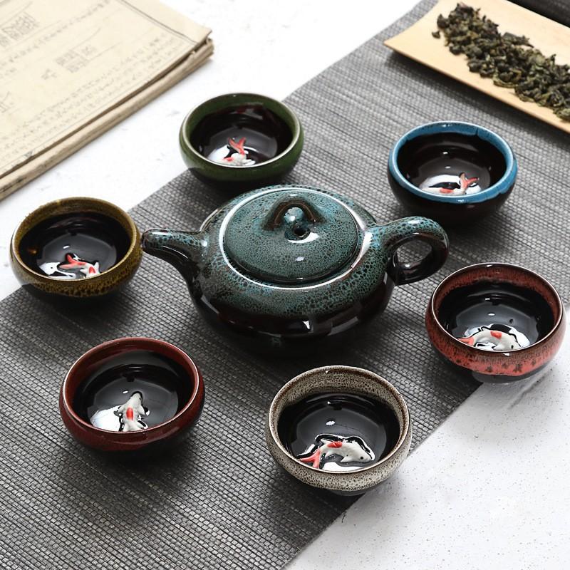 

Kiln Turned Ice Cracked Fish Cup Kung Fu Ceramics 1 Teapot 6 Teacups