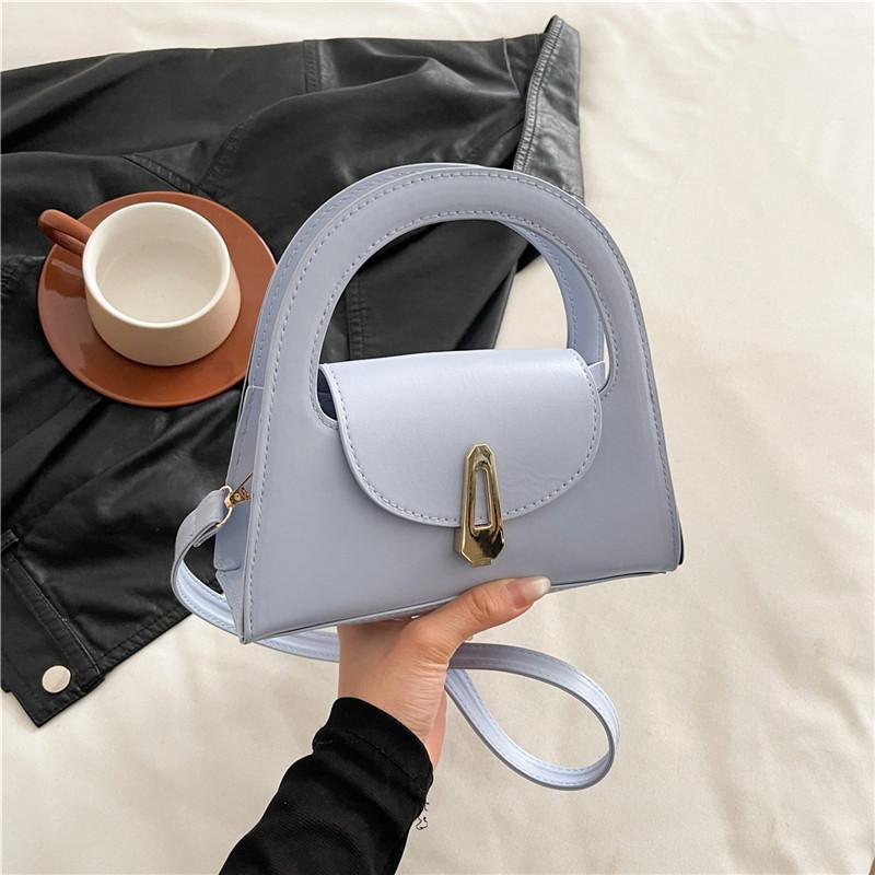 2025 summer new semi-round bag women's solid color retro lock handbag trendy foreign feeling casual messenger bag