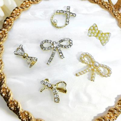 10 Stück Nail Art Schmuck 3D Schleifenform Strasssteine Funkelnde Kunstperlen Nail Charms Dekoration für Nägel
