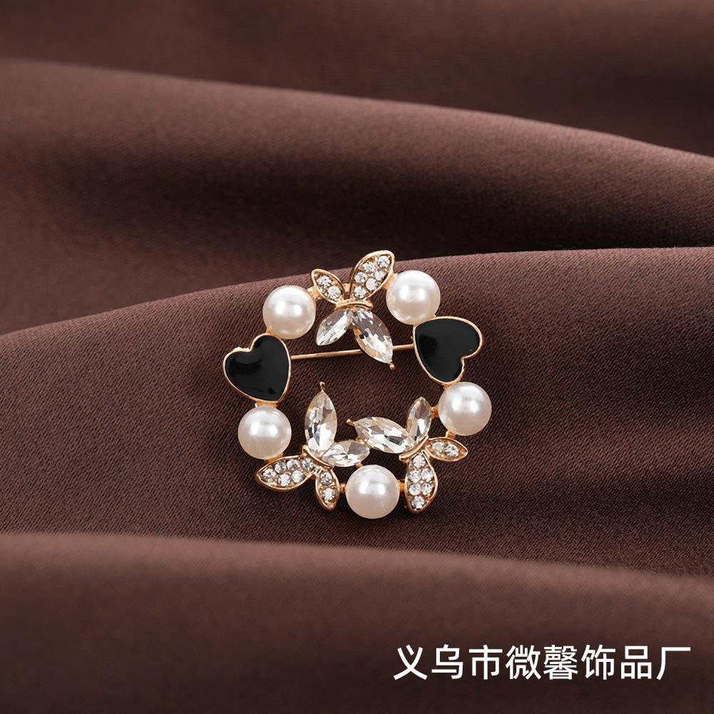 

European and American creative butterfly diamond niche design pearl love temperament anti-light brooch