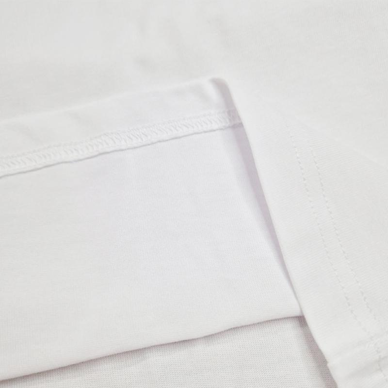 New Balance Camiseta extragrande con el logotipo de Essential Center Nb