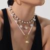 Elegant 18k Gold-Plated Stainless Steel Necklace with Imitation Pearl Beads and OT Clasp
