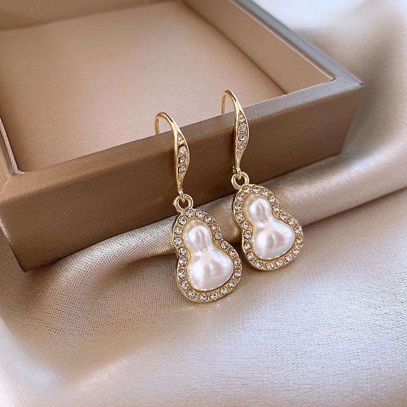 

Silver needle dripping oil water drop fringed earrings antique literary and versatile earrings new Chinese retro temperament earrings women