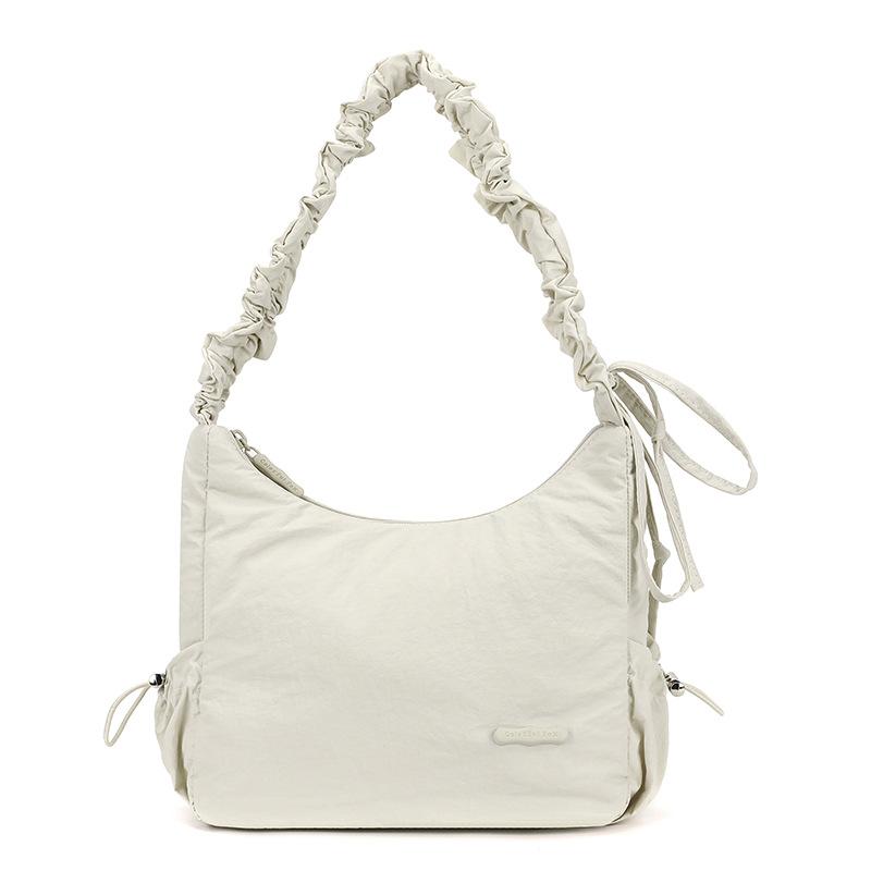 Niche design drawstring pleated bag solid color light and cute versatile shoulder bag