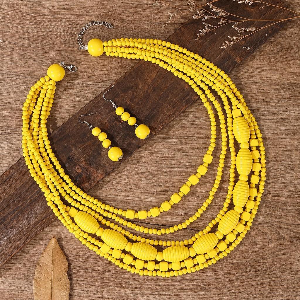 Set di Collana e Orecchini in Perline di Legno Geometriche Bohemien per Feste