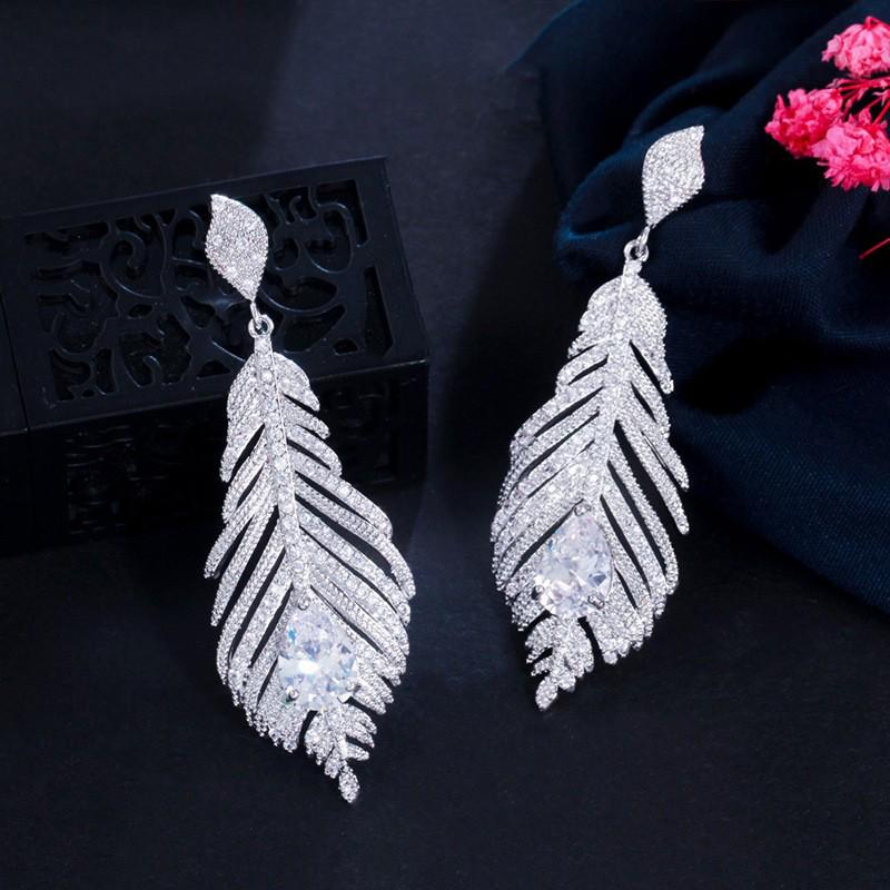 

Элегантные серьги-перья с цирконами - Стильный дизайн с серебряной иглой для женщин
