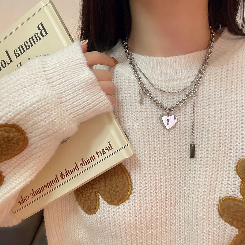 "European & American Double-Layer Love Necklace: Hip-Hop Inspired Long Sweater Chain for Women"