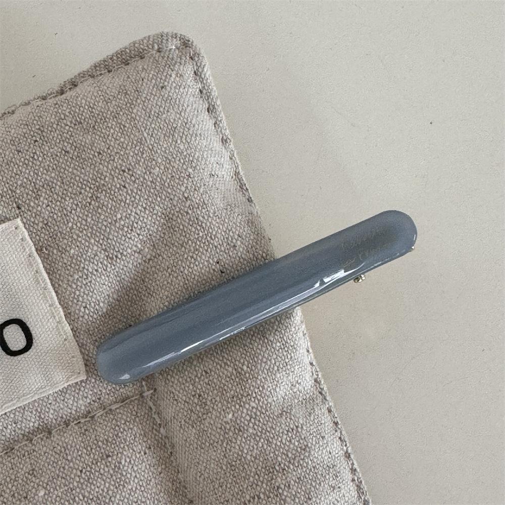 Korean version of the gold label cute little baguette one-word clip French acetic acid texture solid side bangs clip