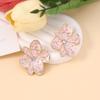 Korean version of simple niche drip oil alloy light pink flower temperament stud earrings, inlaid with zircon exquisite versatile earrings