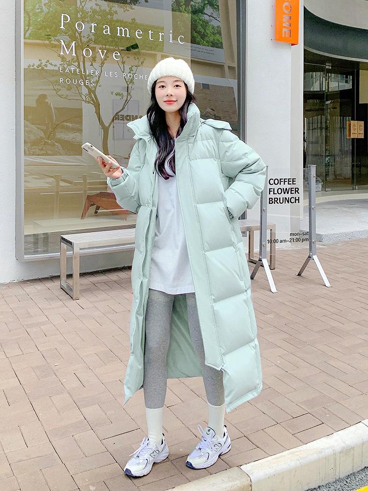 Dámská dlouhá péřová bunda nad kolena - Zima 2025, korejský styl, volný střih, silná výplň z bílého kachního peří, kabát střední délky pro páry