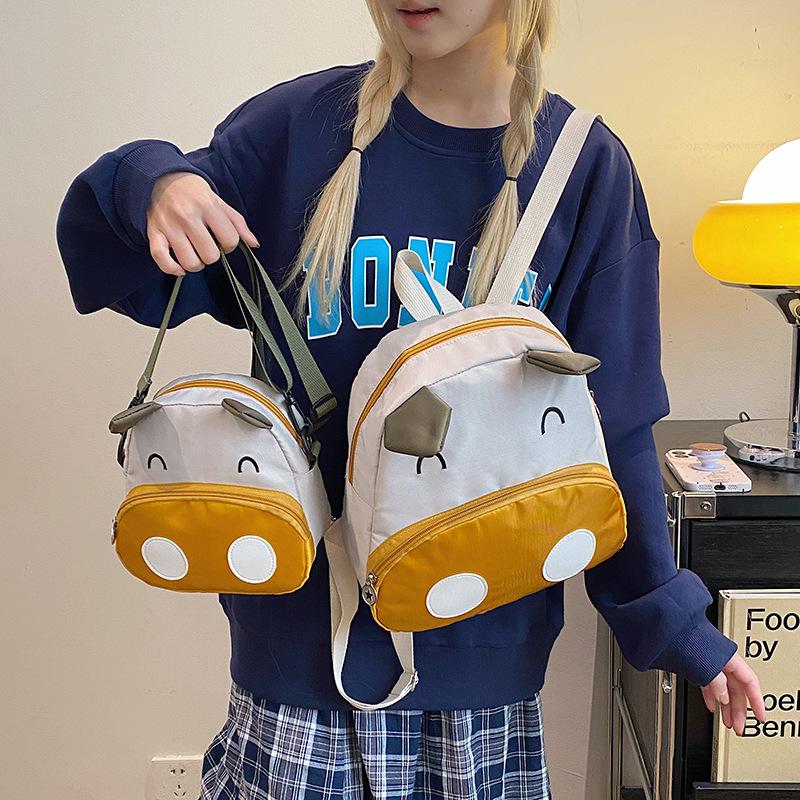 

Three-color patch pig small bag women s new backpack cute versatile student shoulder messenger bag One size