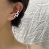 Gu Mao Ning Exquisite Starry Sky Zirconia Ear Cuff: High-End Hollow Star Design, No Piercing Needed.