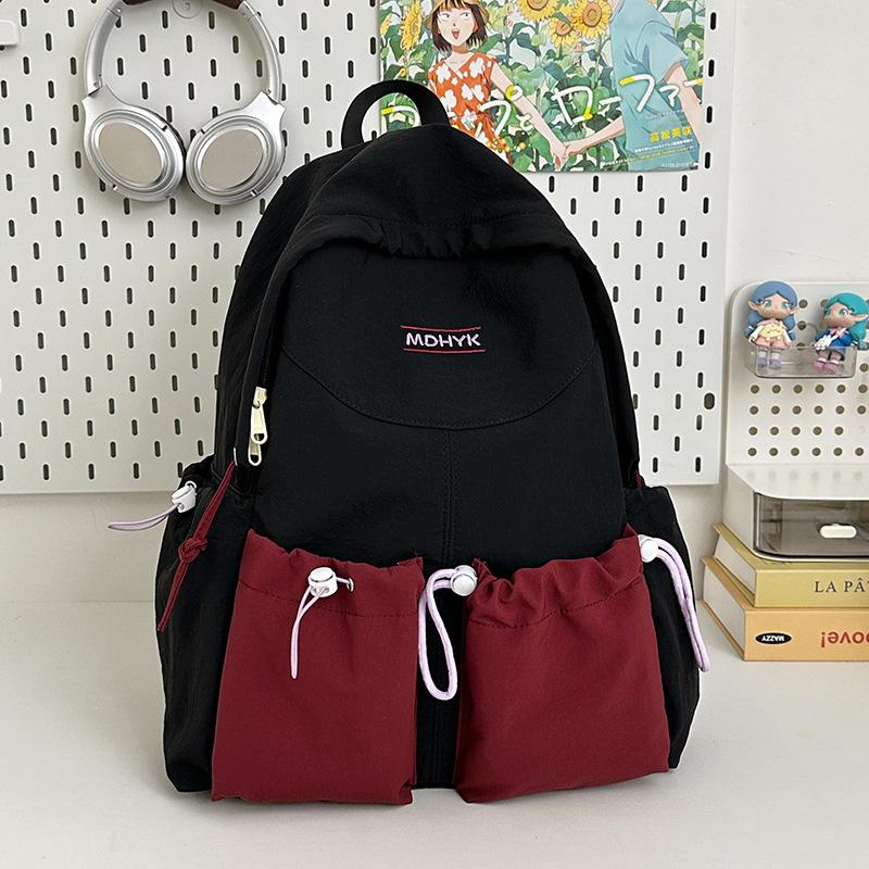 

Fresh and sweet contrasting color splicing backpack, casual and lightweight large-capacity backpack for junior high school students