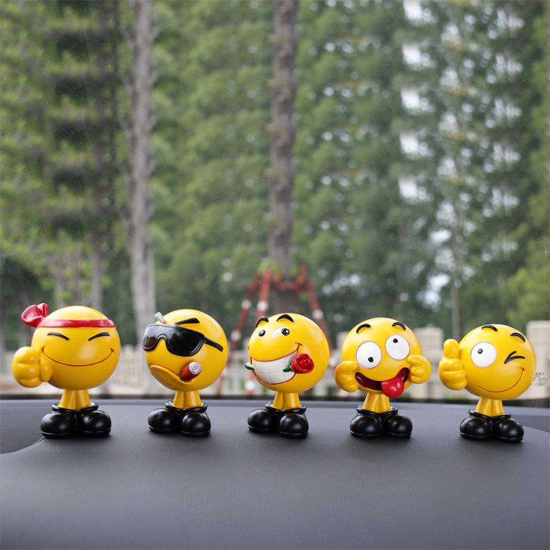 Ha Hu Emoji Bobblehead Car Ornament: Cute Cartoon Interior Decoration.