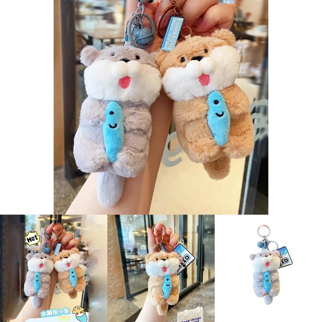 Adorable Plush Otter Keychain Featuring Cute Fish Design Perfect For Gifts And Accessories