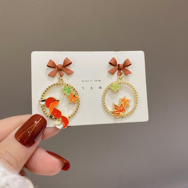Cartoon Style Butterfly Bow Maple Leaf Earrings With A Stylish Design