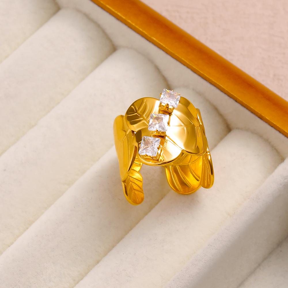 YueShi Luxury Zircon Leaf Ring - European & American Design, Versatile, Elegant, Cross-border Style.