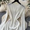 Hollow knitted crew neck dress women's spring and summer wear long sleeves waist A-shaped skirt commuting thin gentle wind