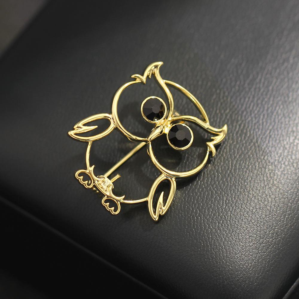 Золотая линия полая инкрустированная черным хрусталем брошь-сова простая универсальная животная булавка одинаково для мужчин и женщин
