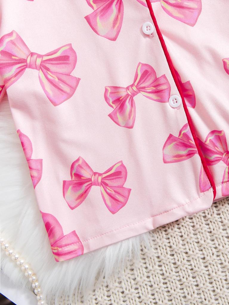 Dziewczęcy zestaw piżamowy z długim rękawem i nadrukiem kokardek, ozdobiony piórkami