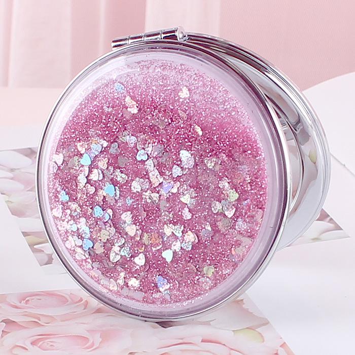 Girlish Heart Double-Sided Portable Makeup Mirror - Cute, Compact, and Foldable.