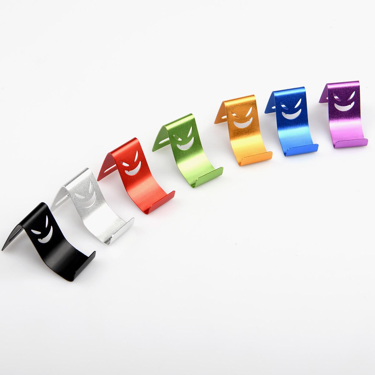 

Smiley Face Aluminum Phone Stand for Desktop Viewing