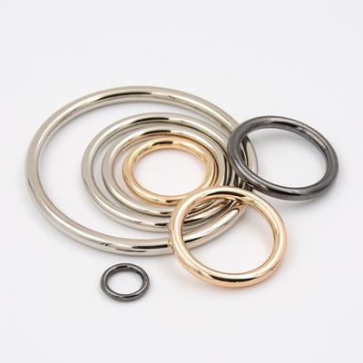 Kovová přezka s kroužkem Zavazadla Dámský trenčkot Kabát Dekorativní knoflík Kruh Oblečení Doplňky