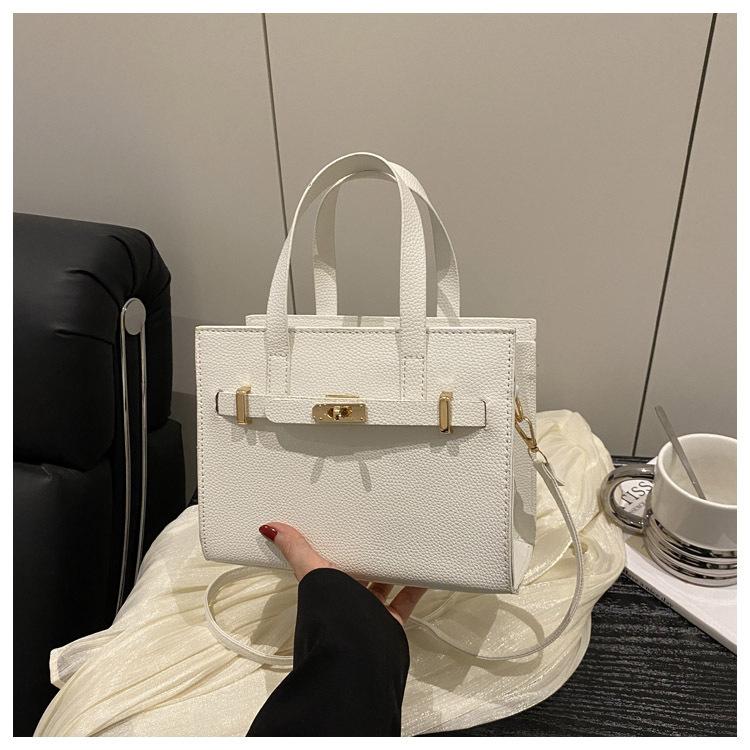 Stor kapacitet sommar vardaglig ny retro mode textur vardaglig bärbar tote crossbody axelväska kvinnor