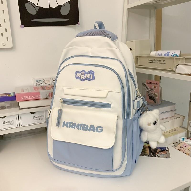 

Schoolbag Women Junior High School Student Good-looking Niche Backpack Large Capacity Multi-Layer Burden Reduction Primary School Student Backpack Light blue Ribbon Hanging