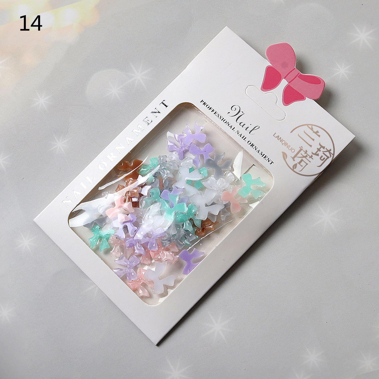 

Аксесуари для нігтів зі смоли: Білі квіти, перлини-метелики, сталеві намистини, кришталеві ведмедики, мікс ромашок